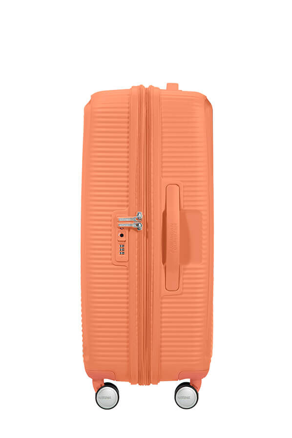SoundBox K&ouml;zepes m&eacute;retű feladhat&oacute; poggy&aacute;sz | American Tourister Soundbox Spinner TSA Expandable 67cm  Cantaloupe