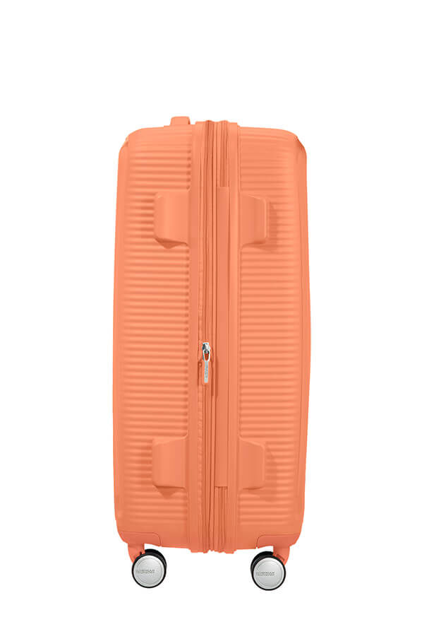 SoundBox K&ouml;zepes m&eacute;retű feladhat&oacute; poggy&aacute;sz | American Tourister Soundbox Spinner TSA Expandable 67cm  Cantaloupe